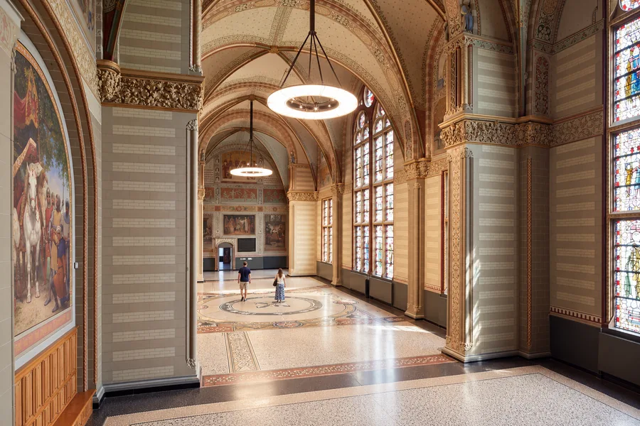 Visitors taking time to explore the Rijksmuseum galleries
